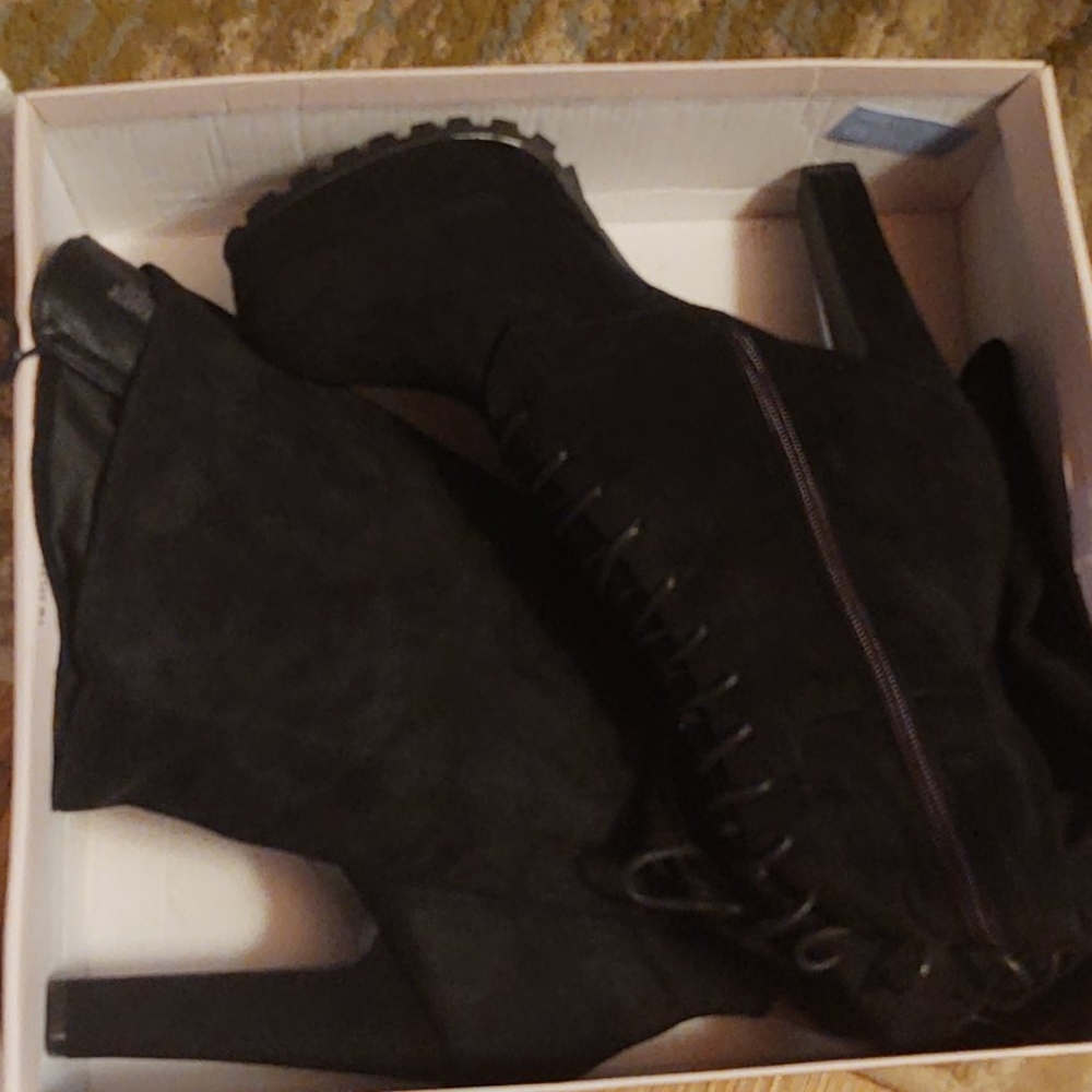 Black thigh high boots